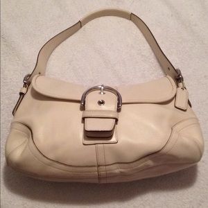 Coach mini bag in white.